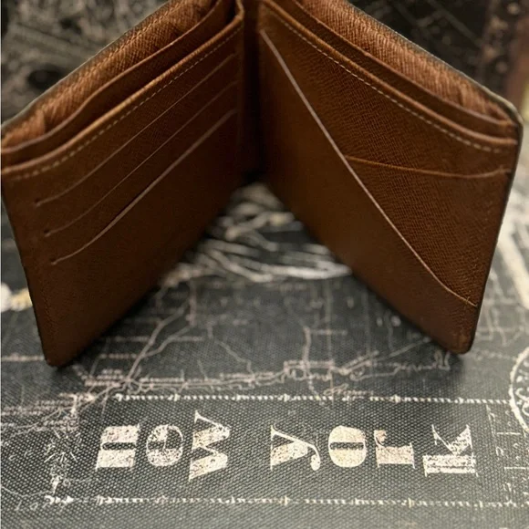 Louis Vuitton men’s multiple monogram wallet.